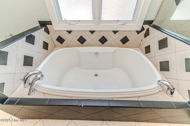 bathroom featuring tiled bath