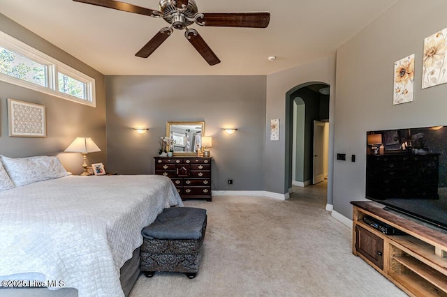 bedroom with light carpet and ceiling fan