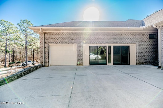 view of property exterior with a garage