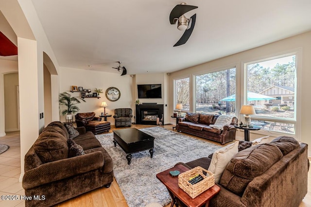 living room featuring ceiling fan