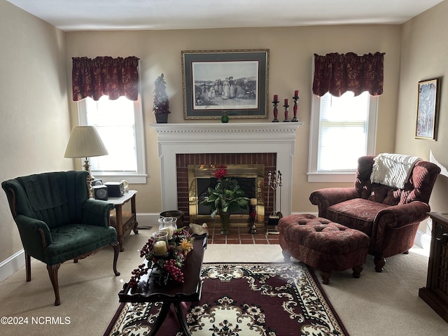 sitting room featuring plenty of natural light and a fireplace