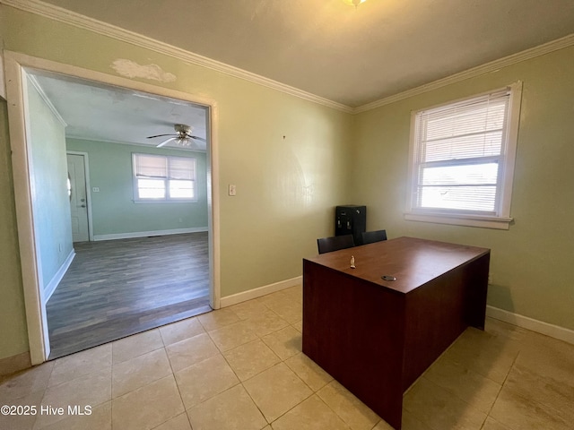 unfurnished office featuring crown molding, plenty of natural light, and light tile patterned floors