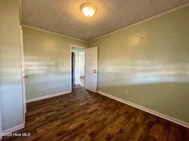 unfurnished room with dark hardwood / wood-style floors and ornamental molding