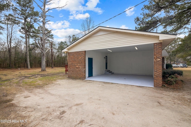 garage with a carport