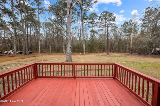 wooden deck with a yard