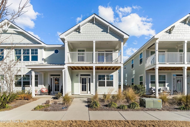 view of front of property with a balcony