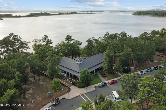 drone / aerial view with a water view