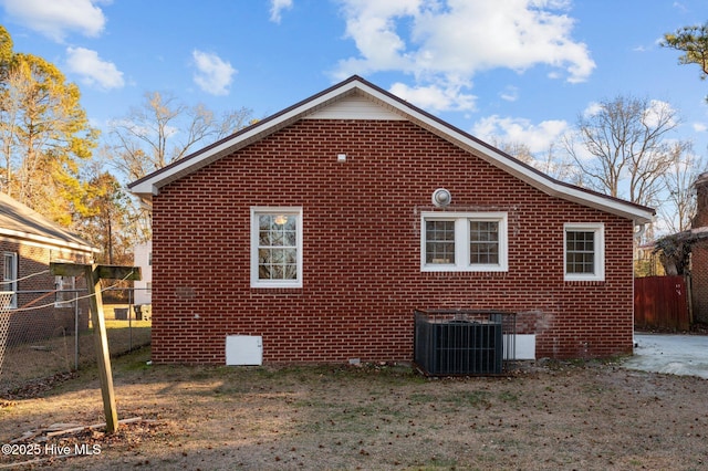 view of home's exterior with central AC