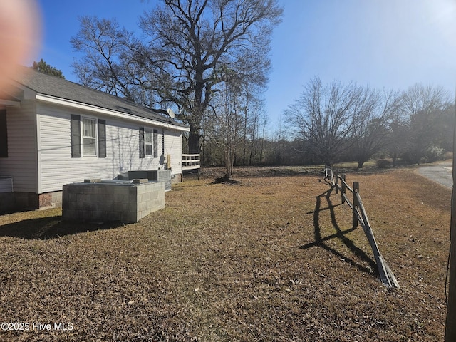 view of yard featuring central AC unit