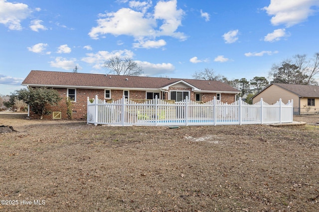 back of house featuring a swimming pool