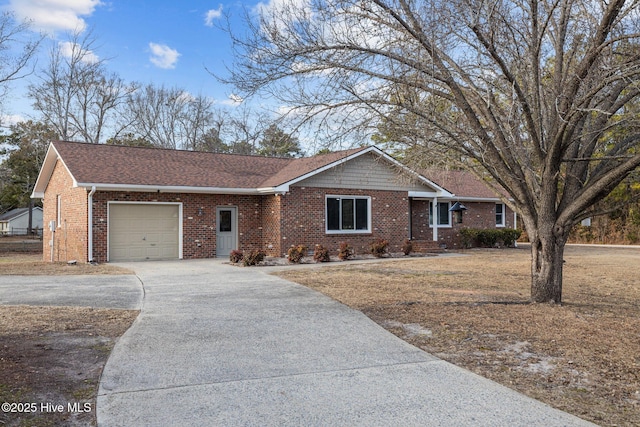 single story home with a garage