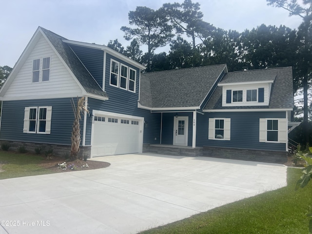 view of front of home with a garage