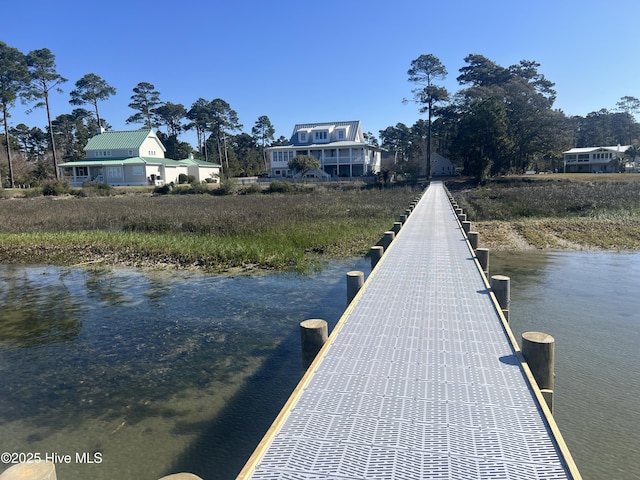 view of dock with a water view