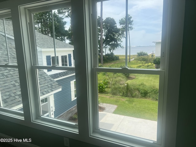 entryway featuring a water view