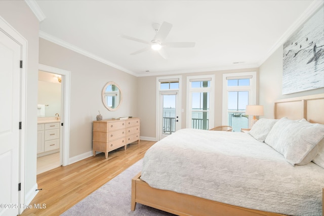 bedroom featuring ceiling fan, crown molding, ensuite bathroom, access to outside, and light wood-type flooring