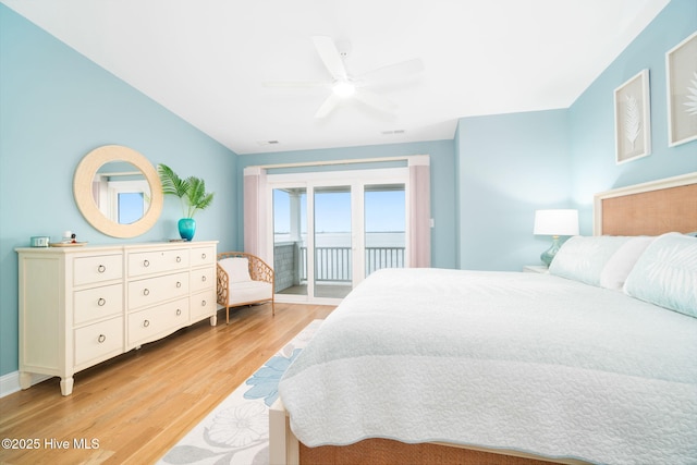 bedroom with access to exterior, ceiling fan, and light hardwood / wood-style floors