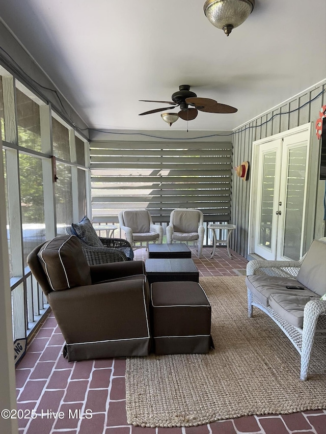 interior space featuring french doors and ceiling fan