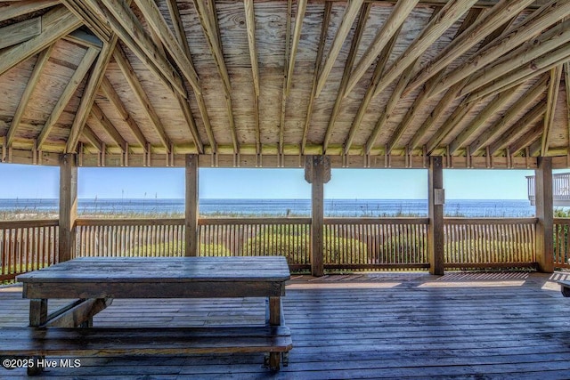 deck with a water view and a gazebo