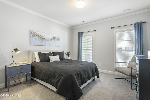 bedroom featuring baseboards, ornamental molding, visible vents, and light carpet