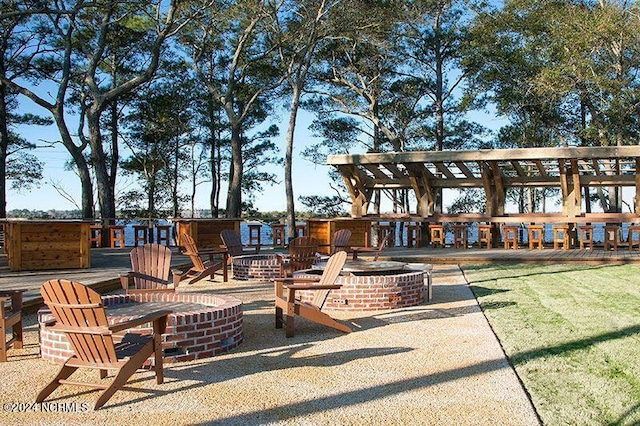 view of patio featuring an outdoor fire pit