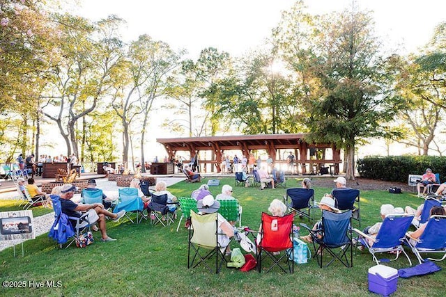 surrounding community featuring a lawn