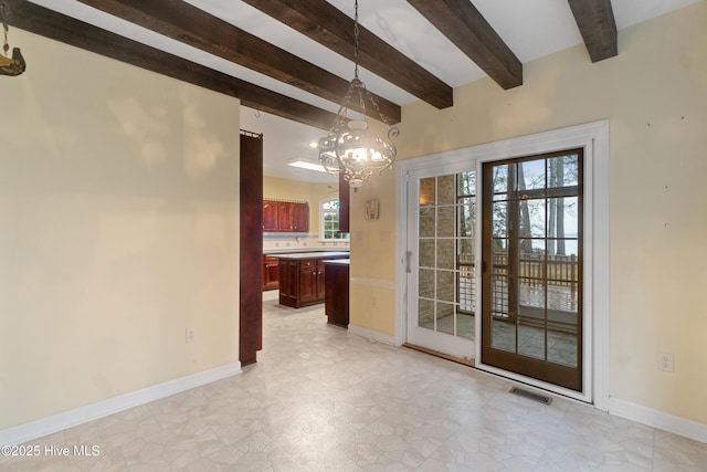 unfurnished dining area featuring beam ceiling and an inviting chandelier