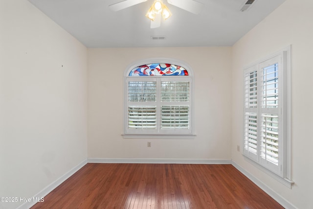 spare room featuring ceiling fan and wood-type flooring