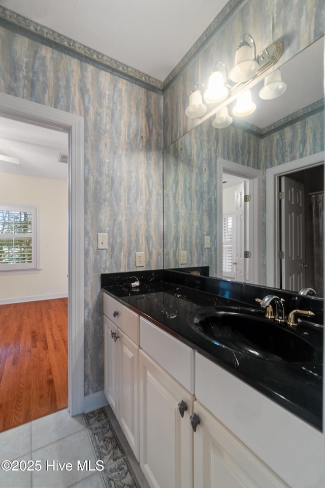 bathroom featuring tile patterned floors and vanity