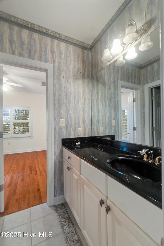 bathroom with vanity, tile patterned floors, and ceiling fan