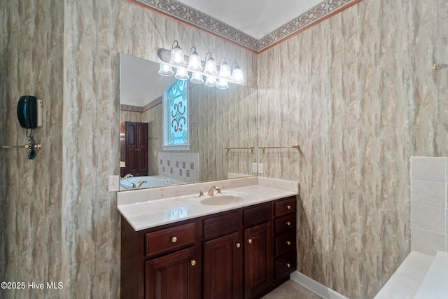 bathroom with tile patterned flooring and vanity