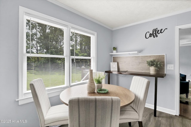 dining space featuring crown molding, dark wood-type flooring, and a textured ceiling