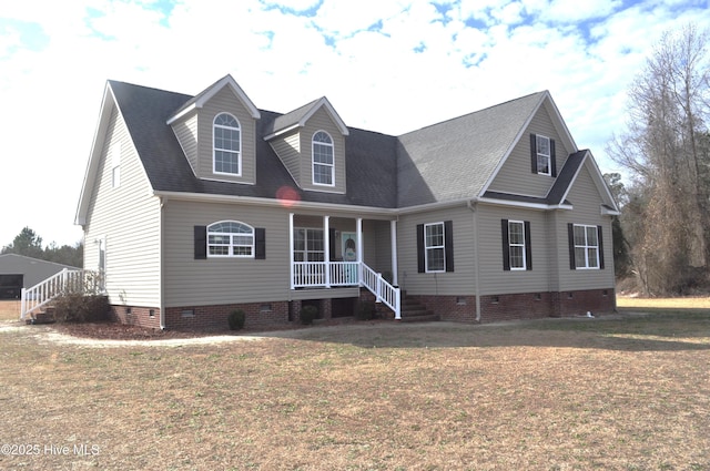 view of front of home with a porch and a front lawn