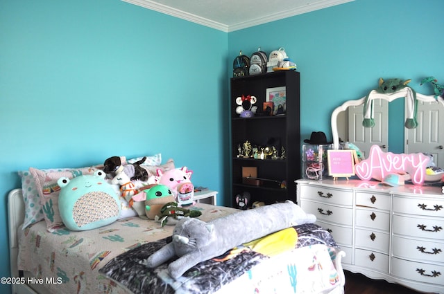 bedroom featuring crown molding