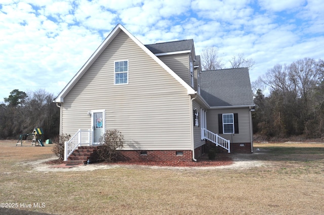 view of property exterior featuring a yard