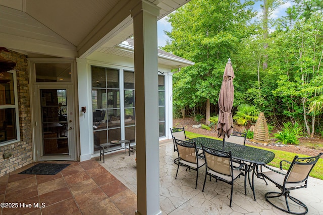 view of patio featuring outdoor dining space