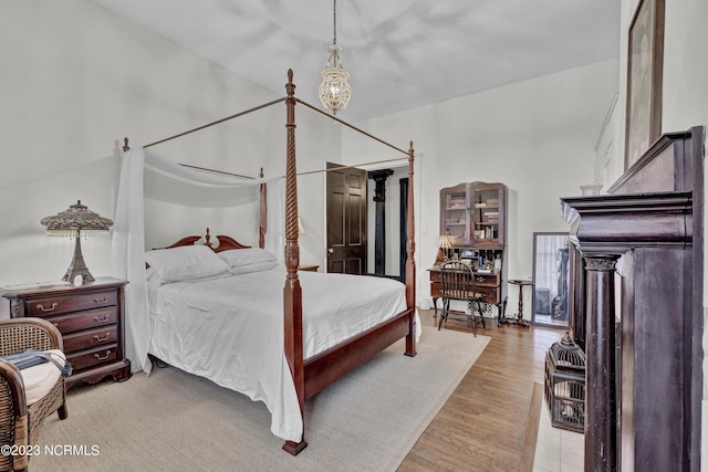 bedroom featuring light wood finished floors