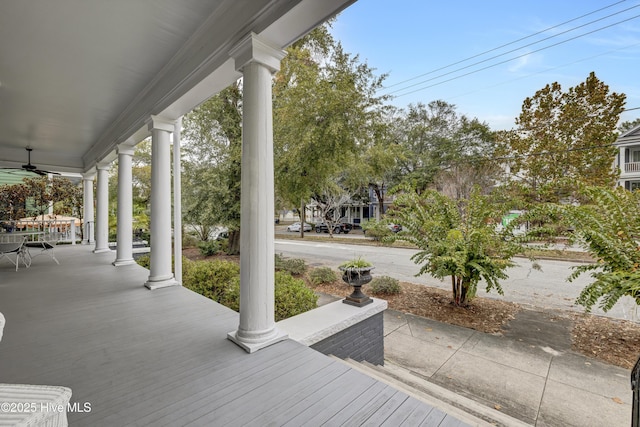 view of patio with a porch and a ceiling fan