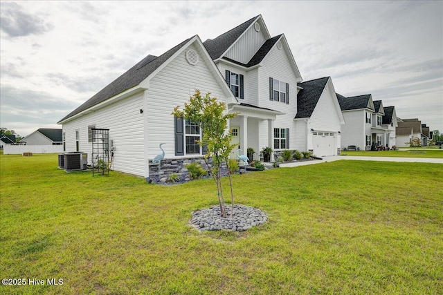 2022 Tarpon Trl, New Bern, NC 28562 - view of front of property featuring cooling unit, a garage, a front yard, and driveway