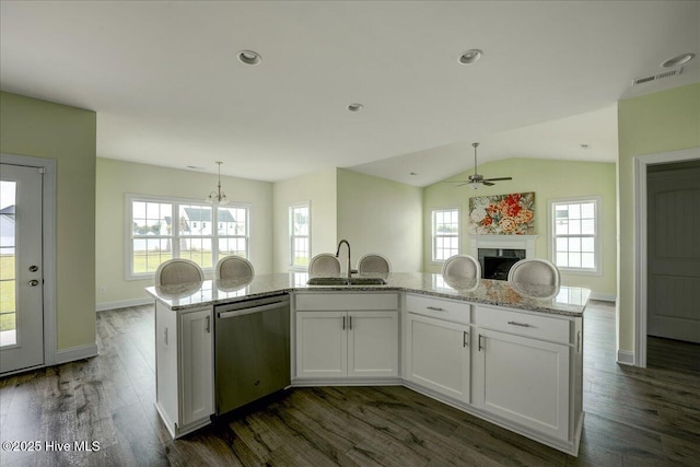 2022 Tarpon Trl, New Bern, NC 28562 - kitchen featuring dishwasher, a sink, a ceiling fan, dark wood finished floors, and light stone countertops