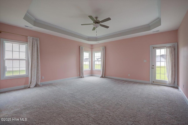 2022 Tarpon Trl, New Bern, NC 28562 - spare room with a raised ceiling, crown molding, a ceiling fan, carpet, and baseboards