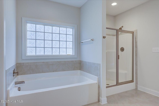 2022 Tarpon Trl, New Bern, NC 28562 - bathroom featuring healthy amount of natural light, a stall shower, and a bath