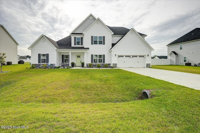 2022 Tarpon Trl, New Bern, NC 28562 - view of front facade featuring driveway, cooling unit, a front lawn, and stone siding