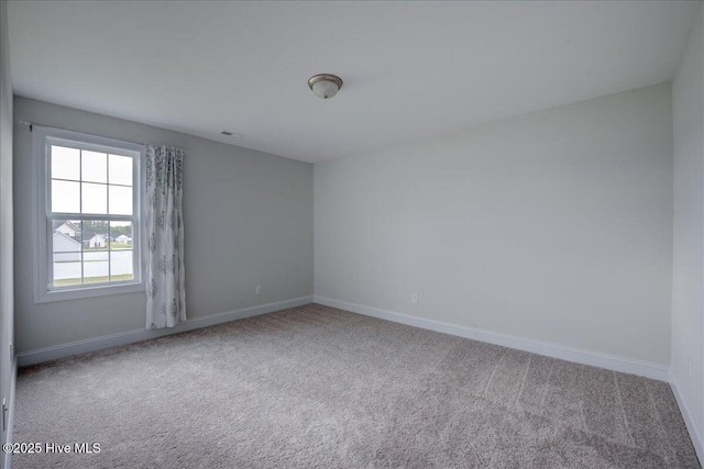 2022 Tarpon Trl, New Bern, NC 28562 - spare room with carpet floors and baseboards