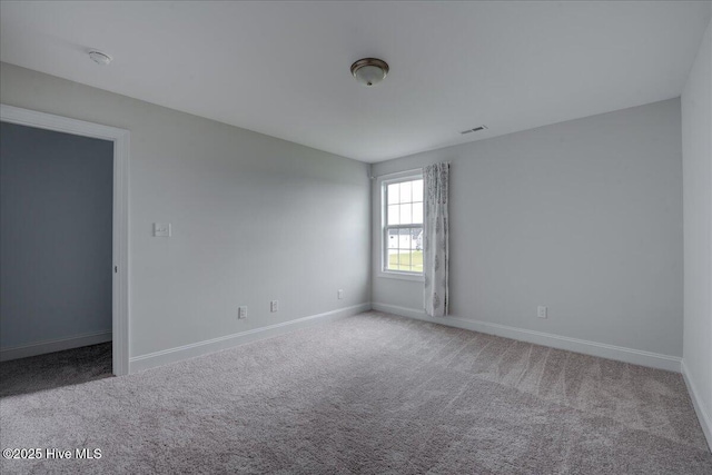 2022 Tarpon Trl, New Bern, NC 28562 - carpeted spare room featuring baseboards and a smoke detector