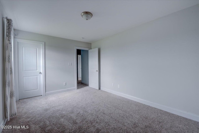 2022 Tarpon Trl, New Bern, NC 28562 - unfurnished bedroom with carpet floors and baseboards