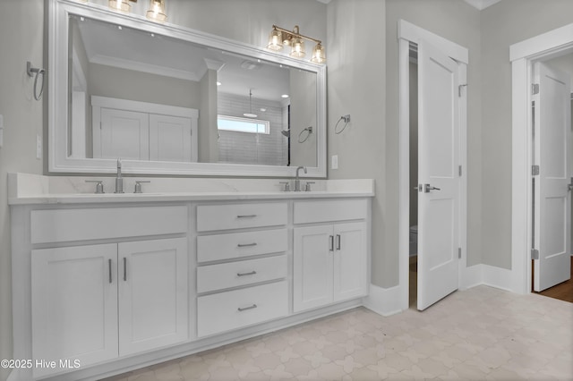 bathroom with vanity, walk in shower, and crown molding