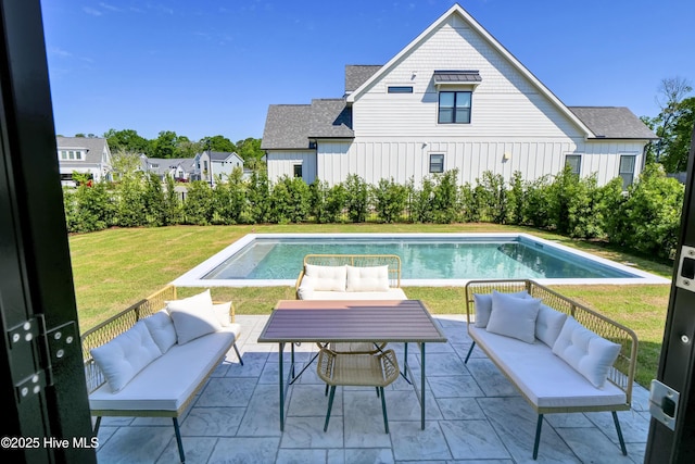 624 Waterstone Dr, Wilmington, NC 28411 - outdoor pool with an outdoor hangout area, a patio, and a lawn