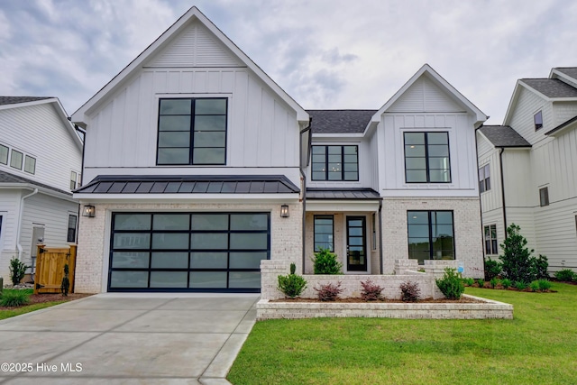 modern farmhouse with a garage and a front lawn