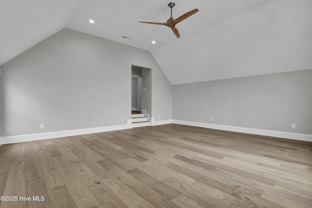 bonus room featuring ceiling fan, light hardwood / wood-style flooring, and vaulted ceiling