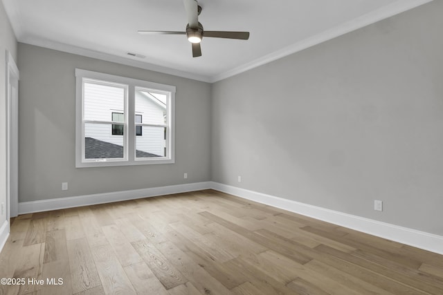 empty room with ceiling fan, light hardwood / wood-style flooring, and ornamental molding